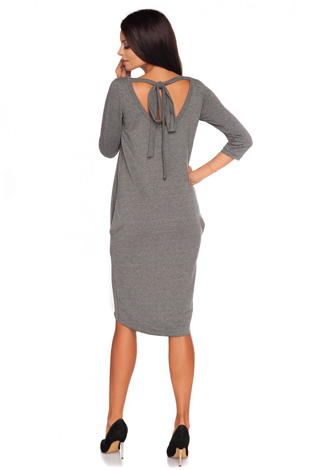 Chic Tessita Knitwear Daydress with stylish bow straps and functional pockets, designed for a luxurious fit.