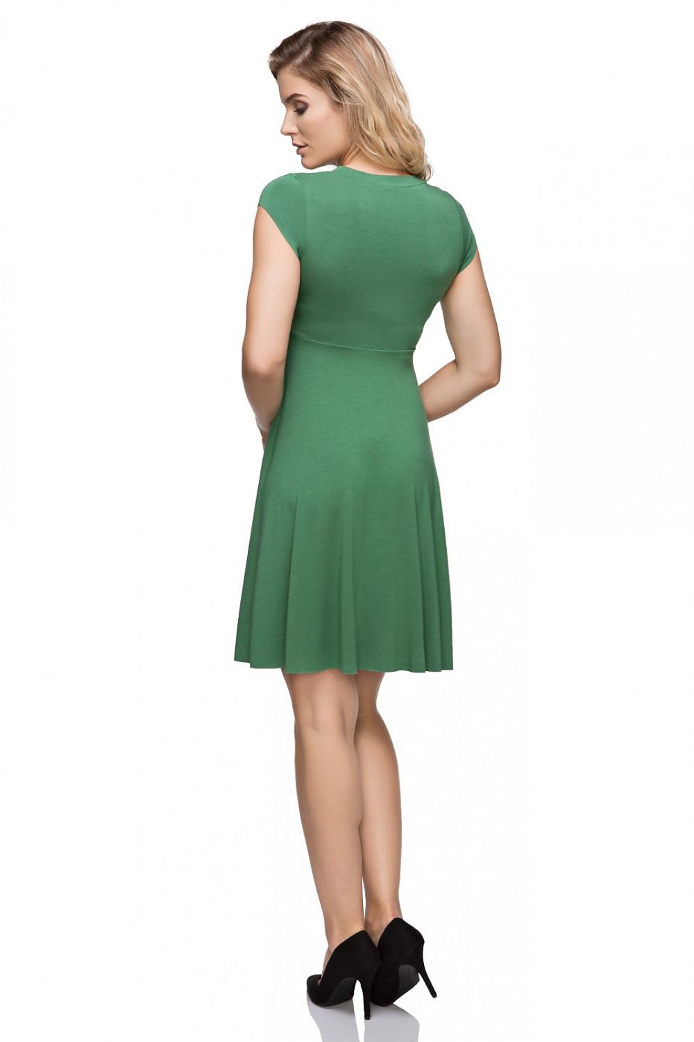 Model wearing the luxury Tessita Evening Dress featuring a deep V neckline, flared hem, and chic raw sleeves, ideal for elegant evening occasions.