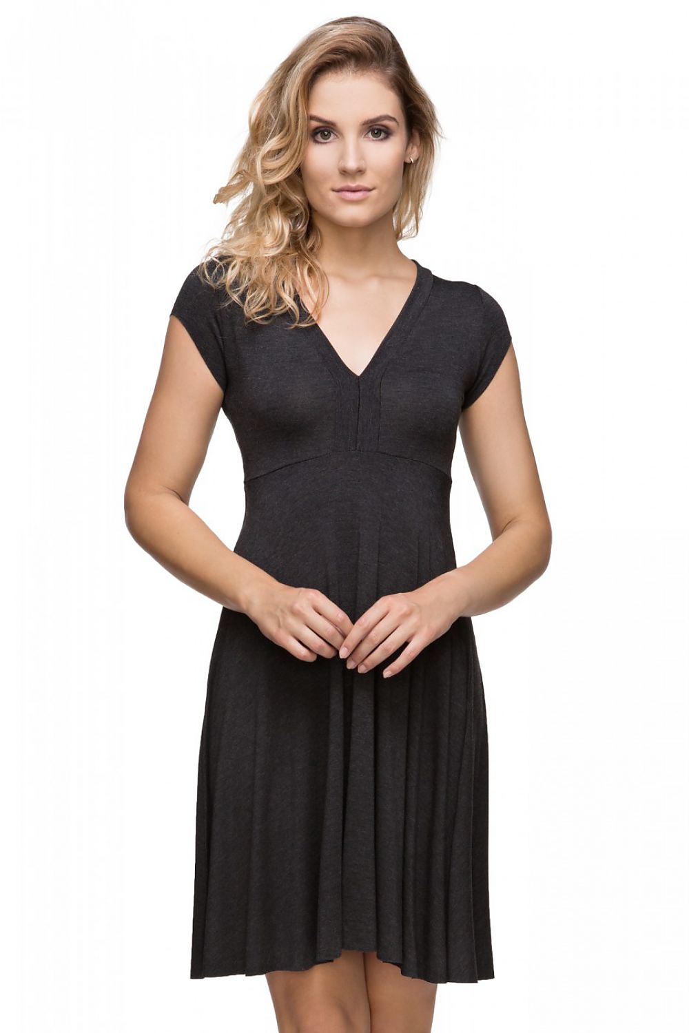 Elegant Knitted Evening Dress by Tessita featuring a deep V neckline and flared bottom, showcasing luxurious design and fine craftsmanship.