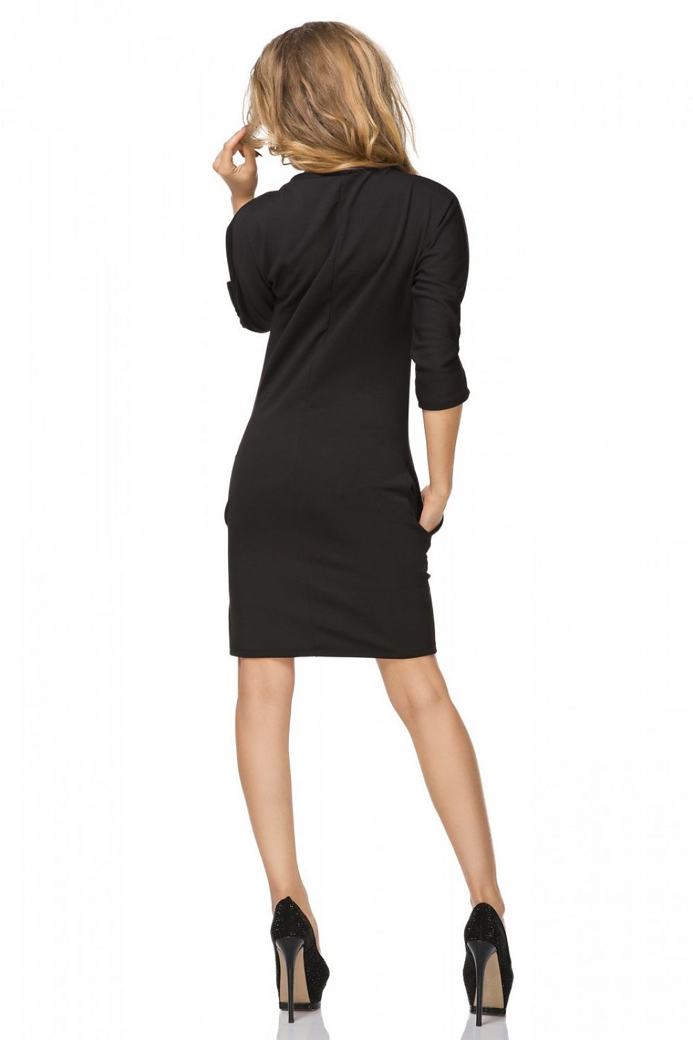 Model wearing Elegant Knit Dress with Seam Pockets and Welt Neckline by Tessita, exemplifying elegance and style in a chic, comfortable outfit.