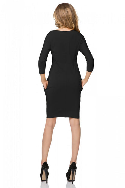 Model wearing the Luxury Sporty Tessita Daydress with Boat Neckline and Pocket Details by Tessita, perfectly demonstrating its style and fit.