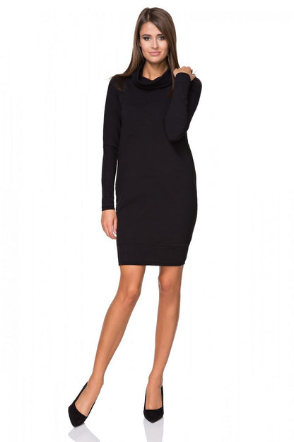 Back view of Tessita's luxury knitted daydress emphasizing the flawless craftsmanship and comfortable fit with a chic turtleneck.