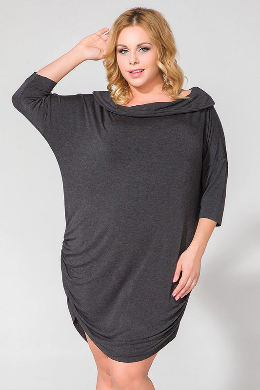 Elegant Knitted Daydress Tessita with Wide Turtleneck and 3/4 Sleeves, featuring a unique raw hem for a luxurious look.