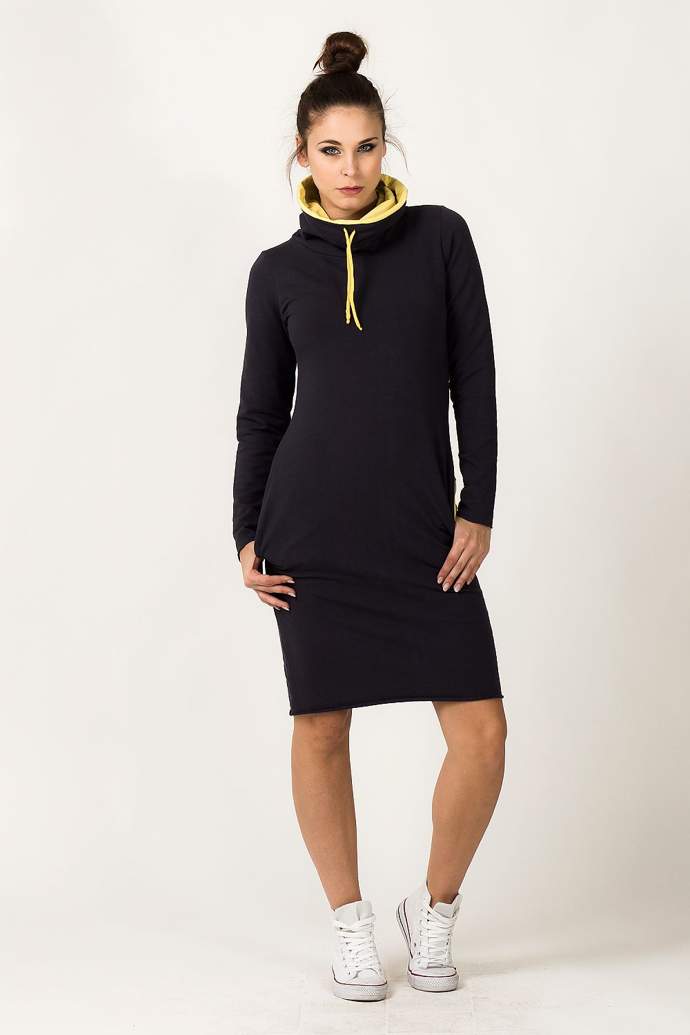 Close-up of the sporty Tessita Daydress, showcasing its vibrant colours and unique turtleneck collar detail in luxurious sweatshirt fabric.
