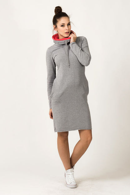 Stylishly presented Sporty Tessita Daydress with distinctive turtleneck collar, exemplifying a blend of fashion and comfort for the modern woman.