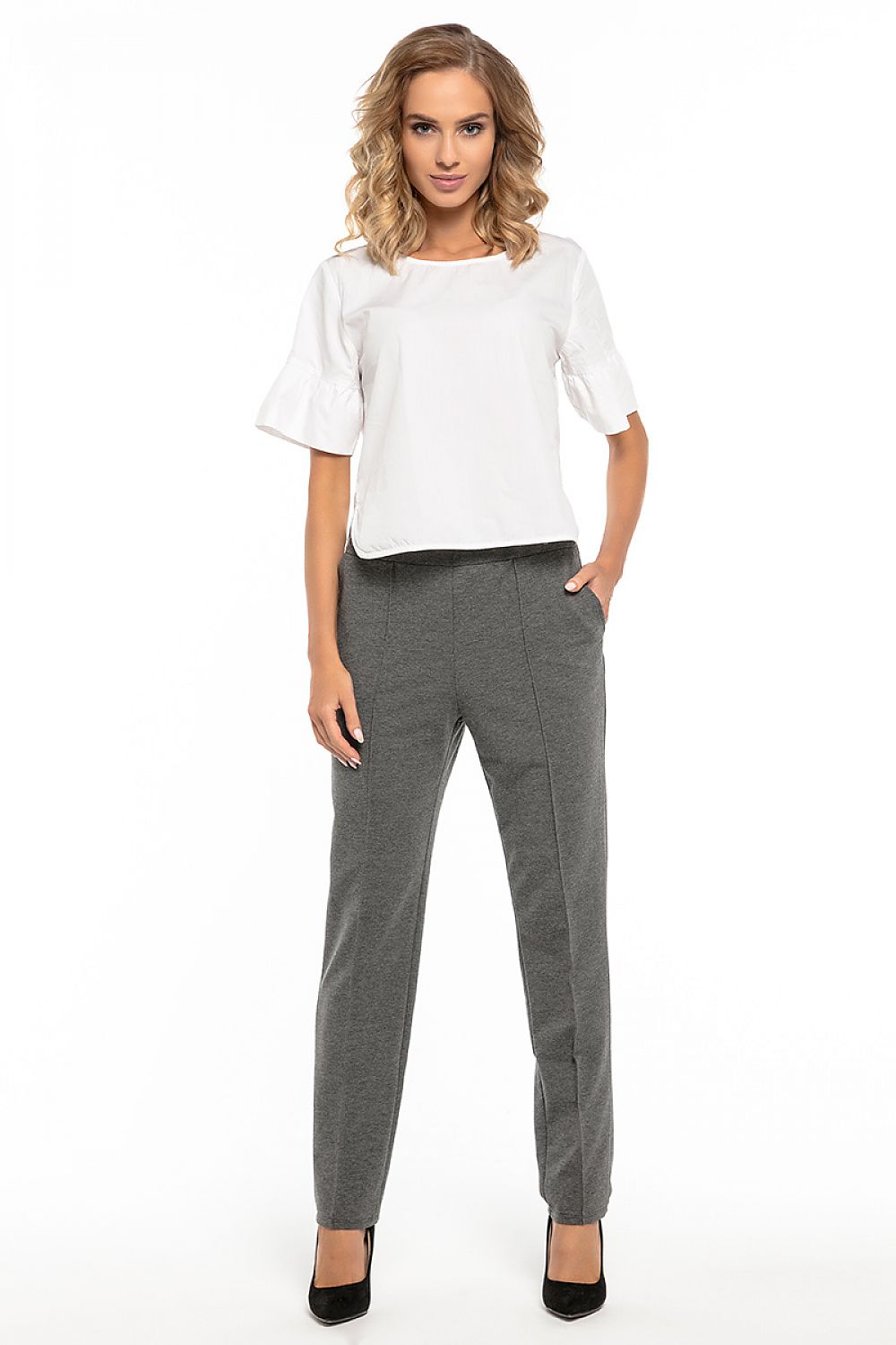 Refined women's trousers by Tessita made of soft cotton knit, showcasing elegance with functional pockets.