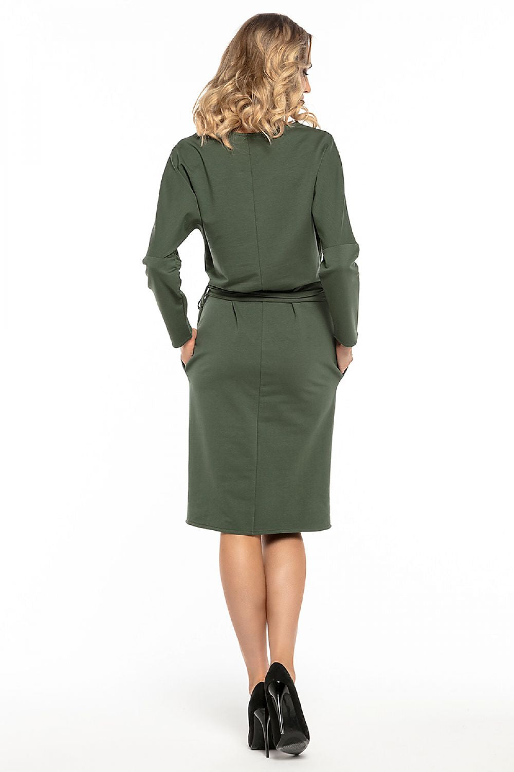 Stylish Tessita Kimono Daydress displayed with elegant drapes, featuring a belt and practical slip pockets for contemporary fashion.