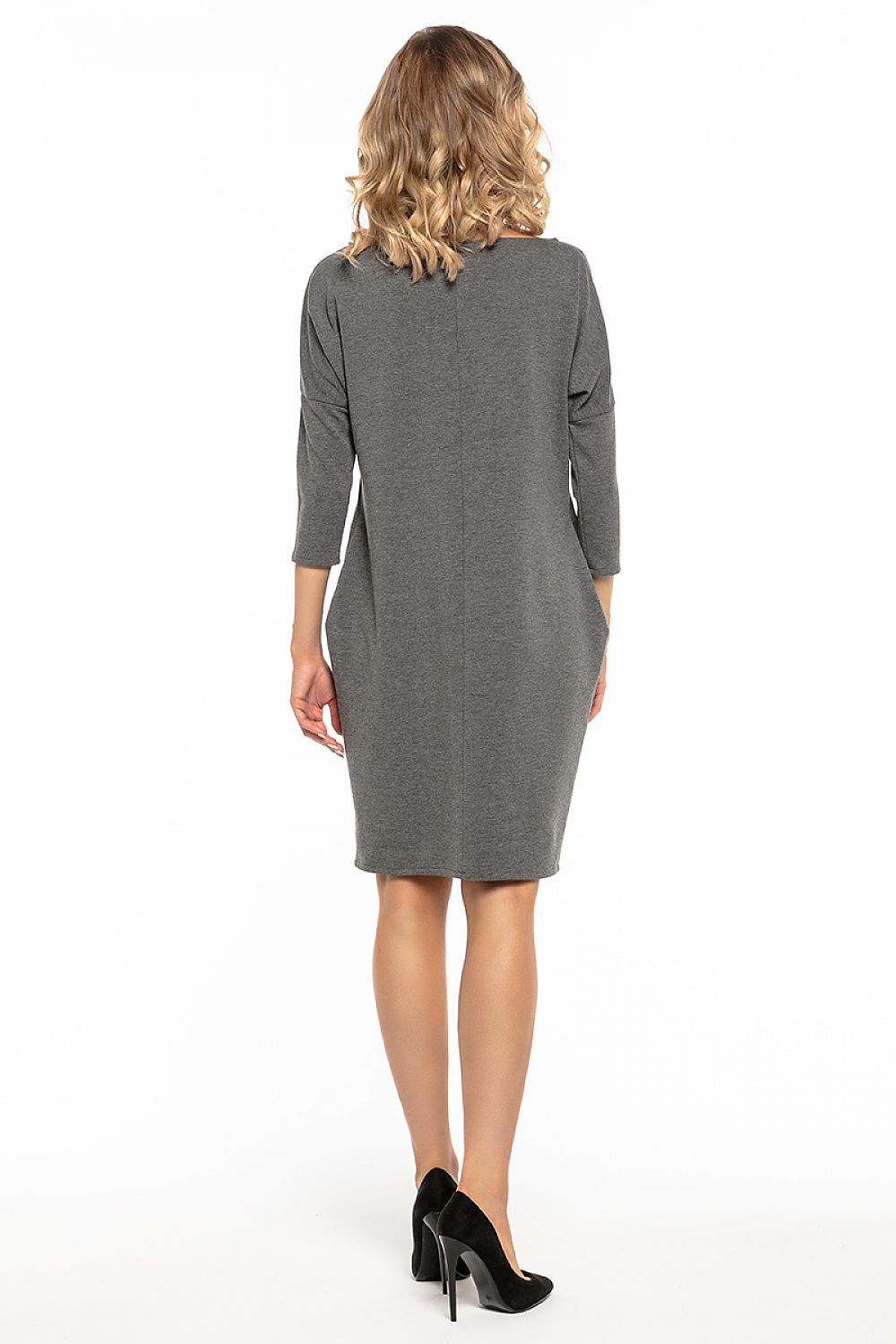 Elegant loose-fitting daydress by Tessita featuring a boat neckline and 3/4 sleeves, designed for comfort and style.