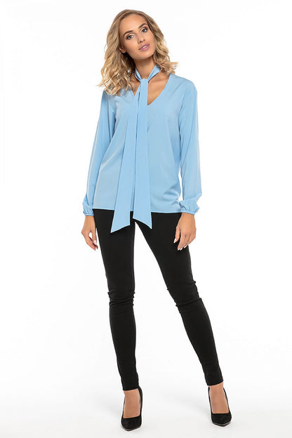Stylish Tessita chiffon blouse with a deep neckline and elegant design, perfect for sophisticated occasions.