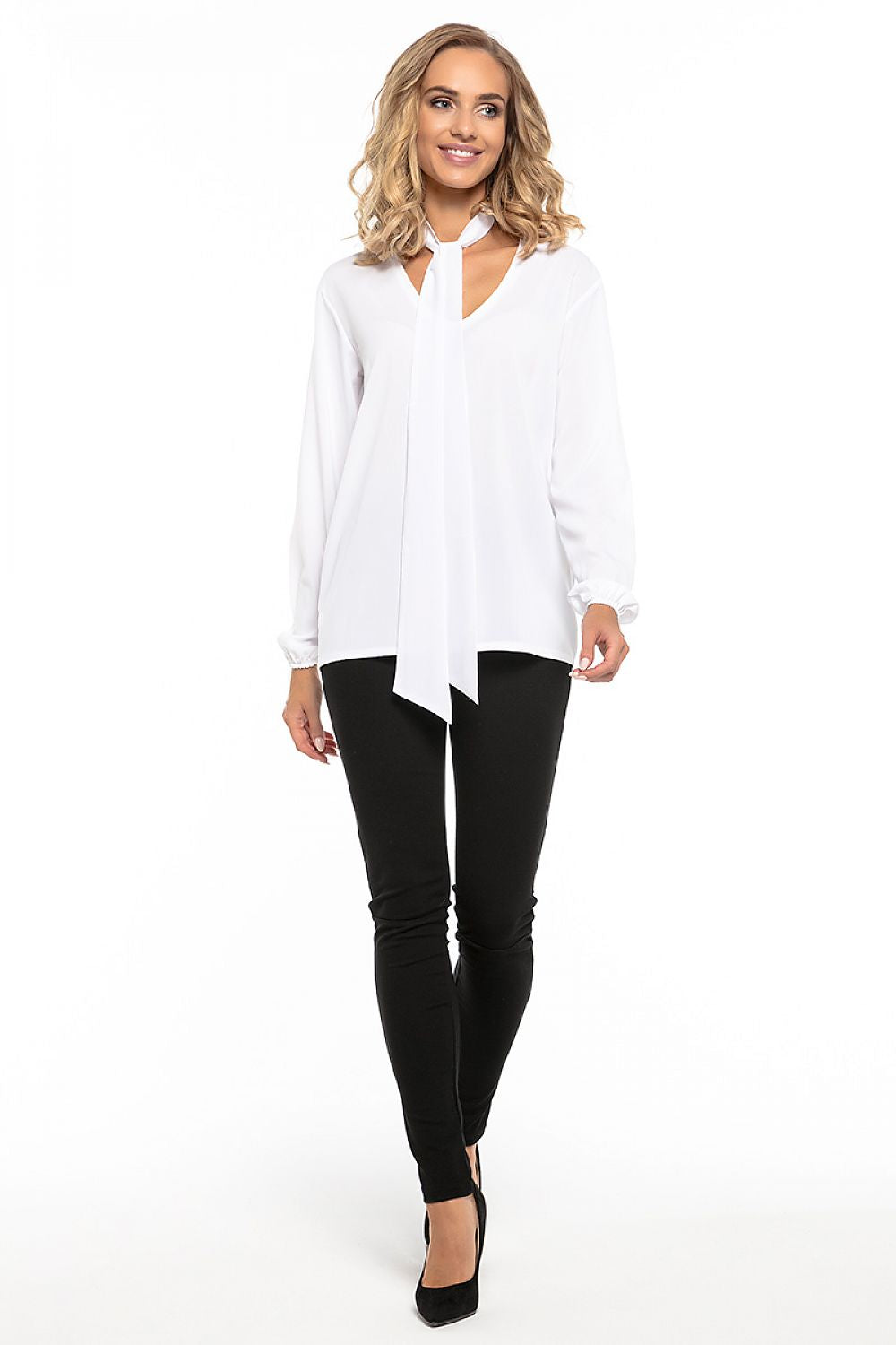 Elegant chiffon blouse with deep neckline and elastic sleeves by Tessita, showcased on a luxurious display.