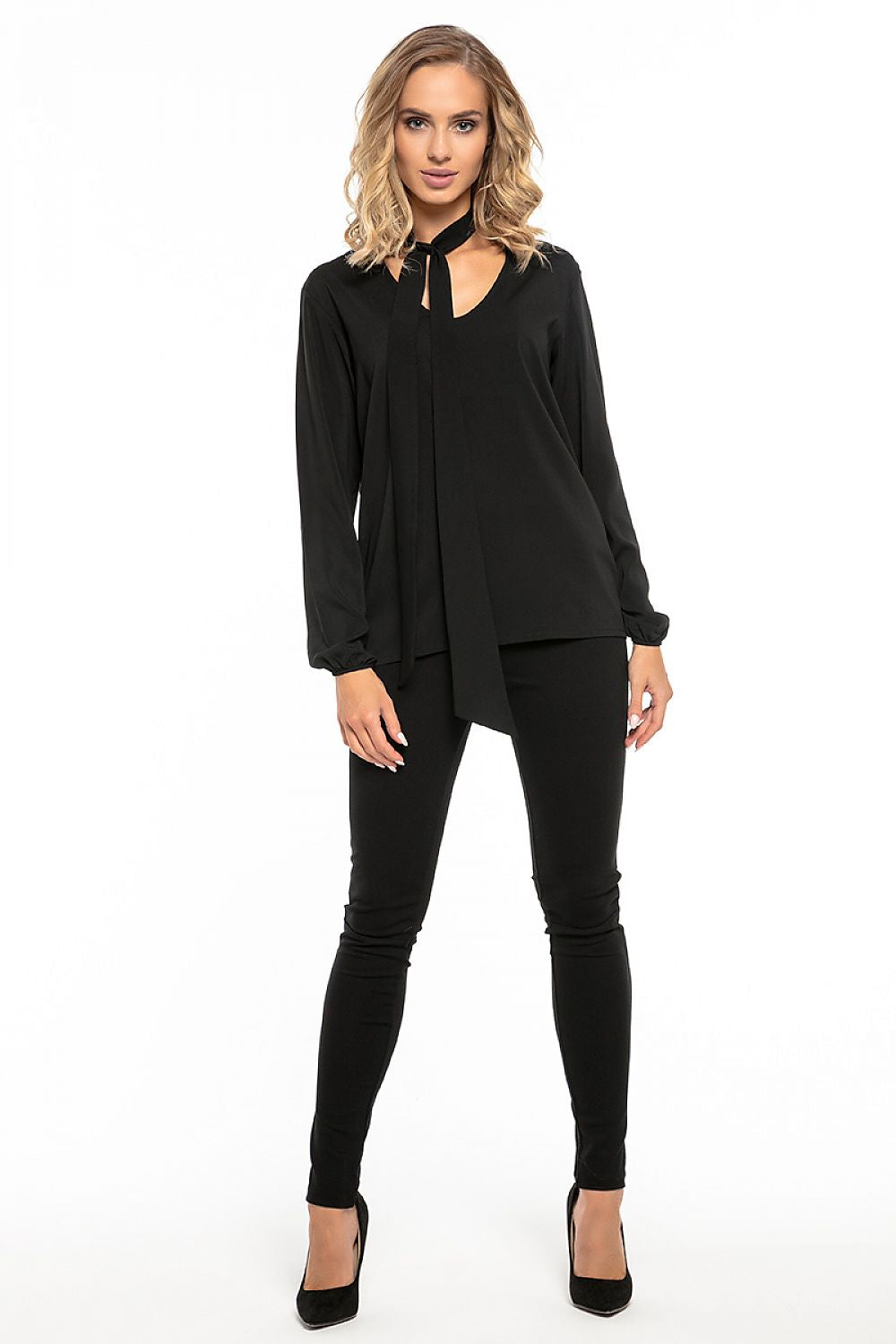 Close-up of Tessita chiffon blouse detailing the soft fabric and intricate design.