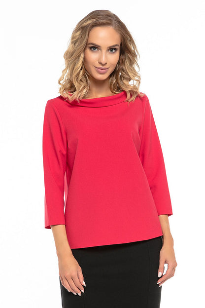 Elegant Jackie Kennedy style blouse by Tessita, showcasing intricate fabric and a sophisticated half-golf neckline.