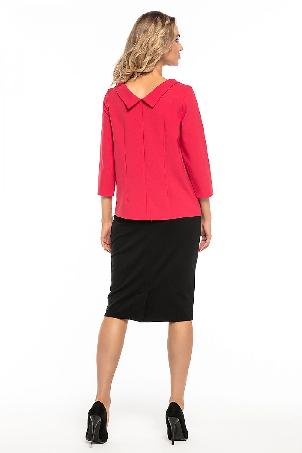 Model wearing the Tessita Jackie Kennedy style blouse, elegantly paired with tailored trousers for a chic ensemble.