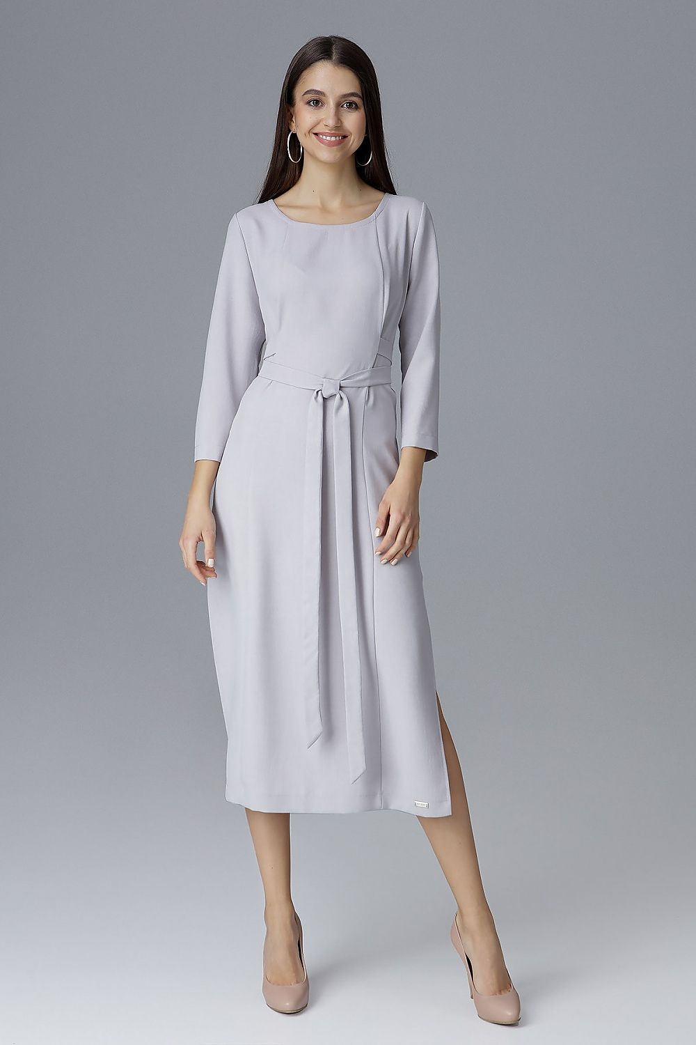 Elegant Figl cocktail dress featuring 3/4 sleeves, waist tie, and sophisticated side slits for a luxurious look.