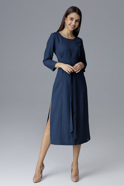 Figl luxurious over-the-knee dress with refined 3/4 sleeves and elegant fit, ideal for cocktail events.