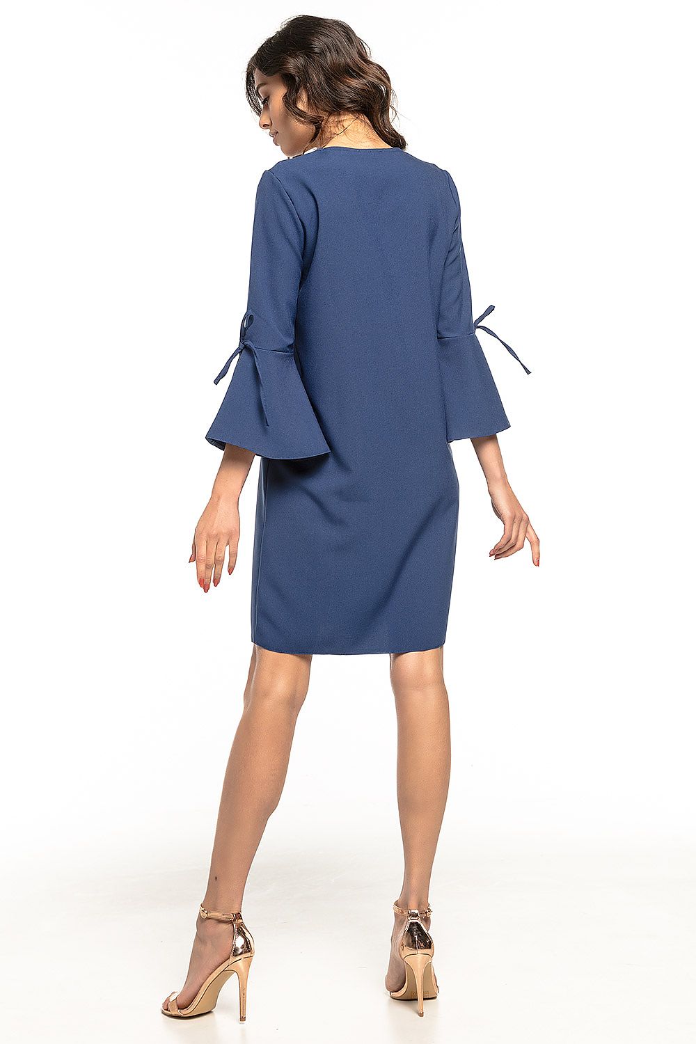 Sophisticated loose-fitting Tessita dress, designed to enhance grace and comfort for special events.