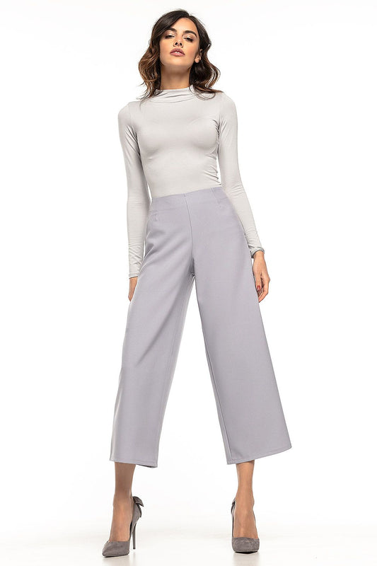 Luxury high waisted 7/8 trousers by Tessita, featuring a wide leg and decorative side zip, perfect for chic elegant styling.