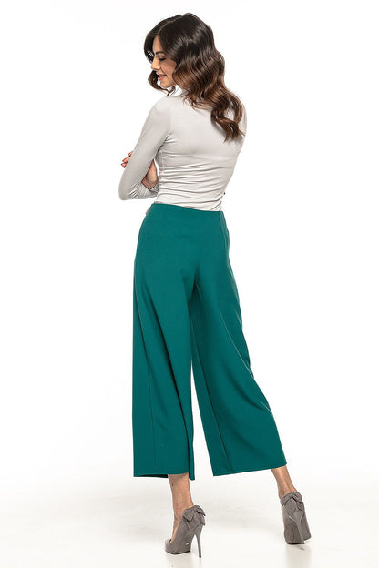 Back view of Tessita's stylish high waisted trousers, designed with flattering darts and wide legs for a contemporary silhouette.