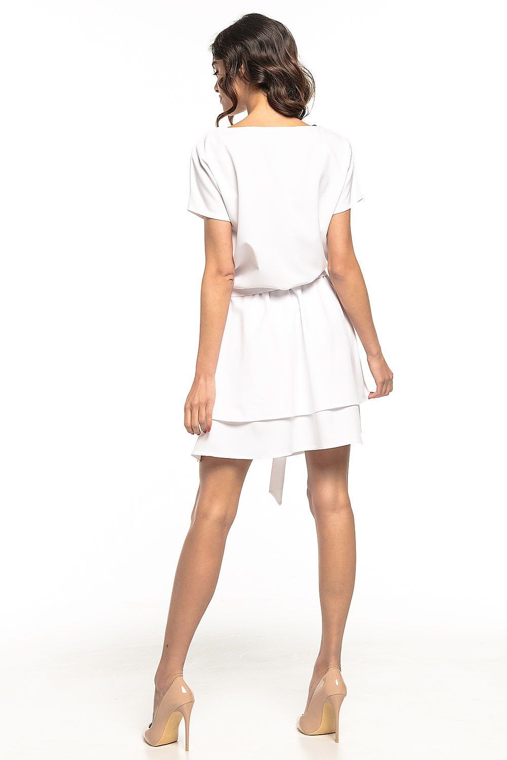 Back view of the Tessita Daydress, revealing the graceful silhouette and flowing double skirt.