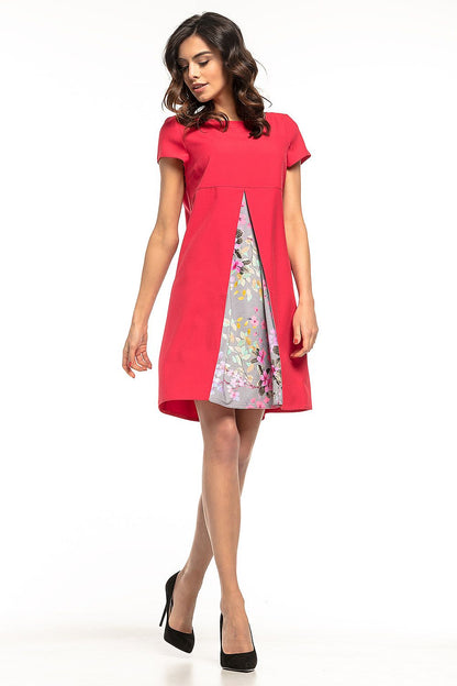 Tessita's exquisite woven daydress featuring a stunning floral pattern, perfect for both work and social occasions.