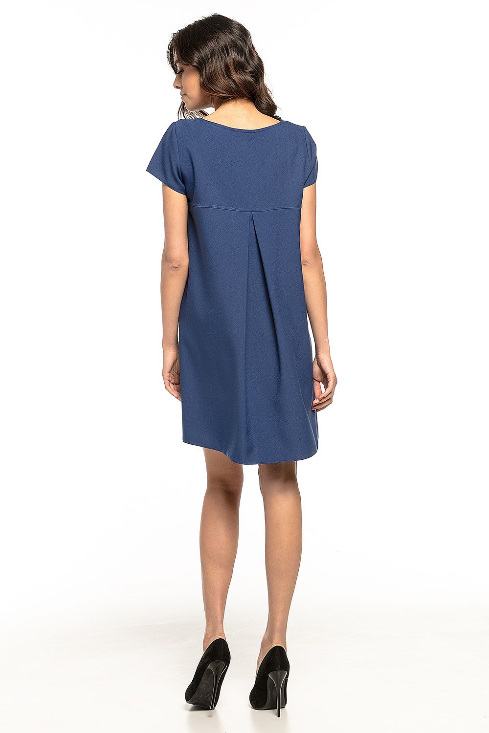 Chic Tessita daydress with a stylish ruffled detail at the back, embodying luxury and girlish charm.