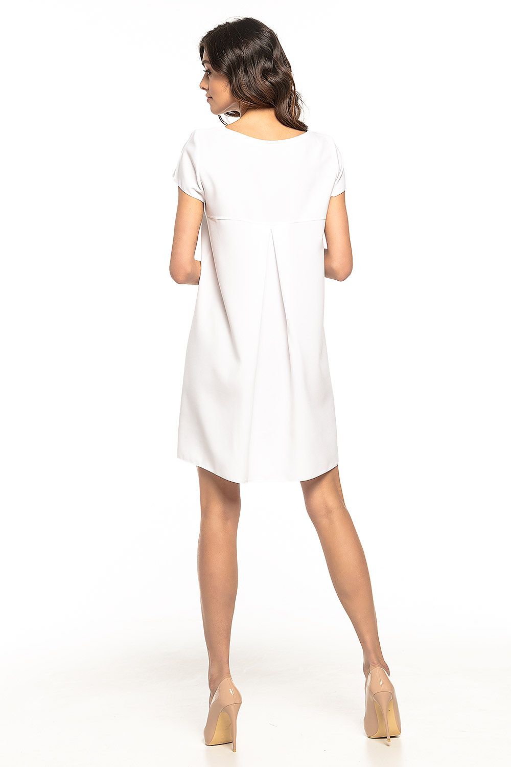Tessita Daydress displayed elegantly on a hanger, focusing on the unique ruffled back feature that embodies sophistication and girly charm.