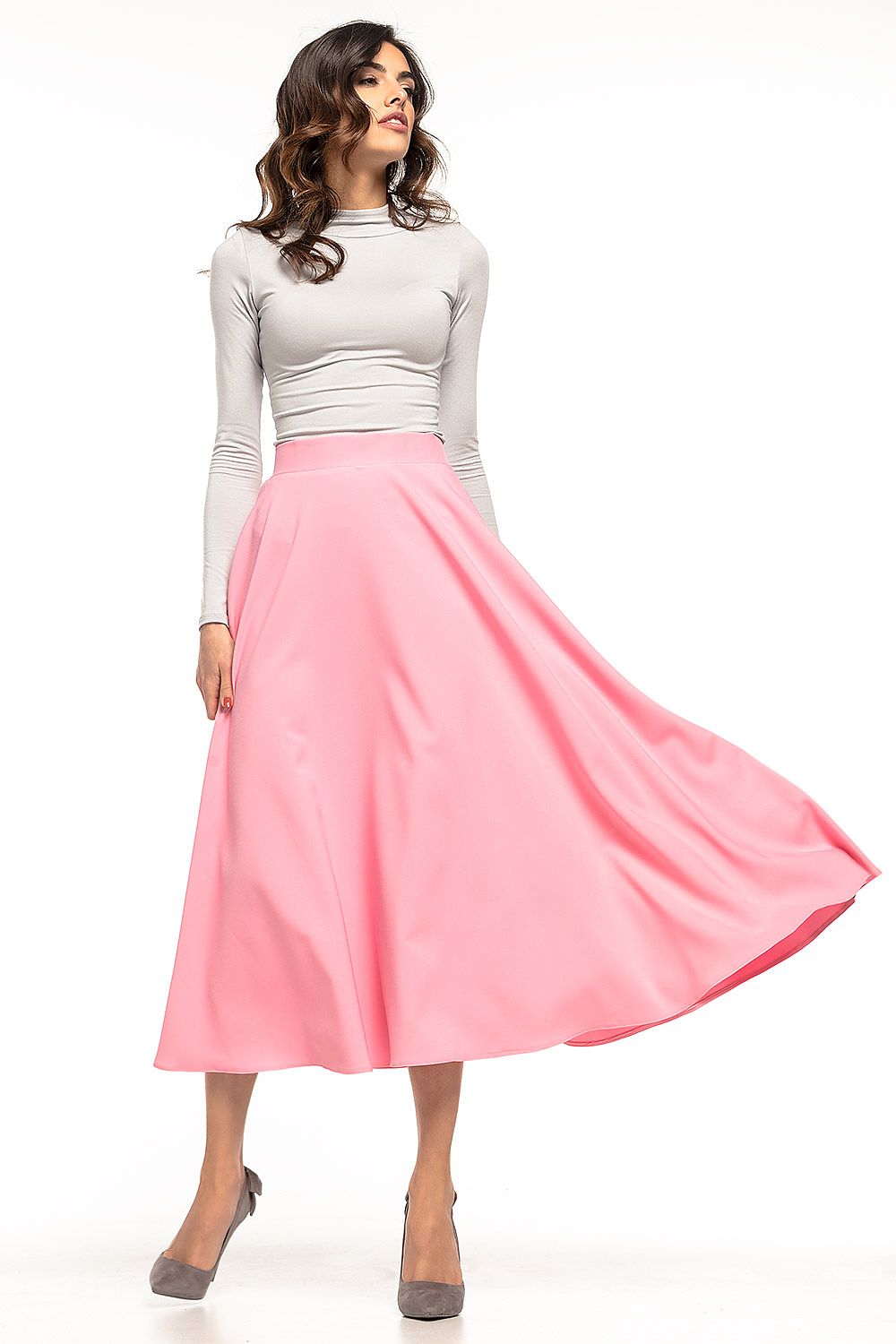Glamorous midi skirt by Tessita available in various sizes, perfect for adding a touch of elegance to any outfit.