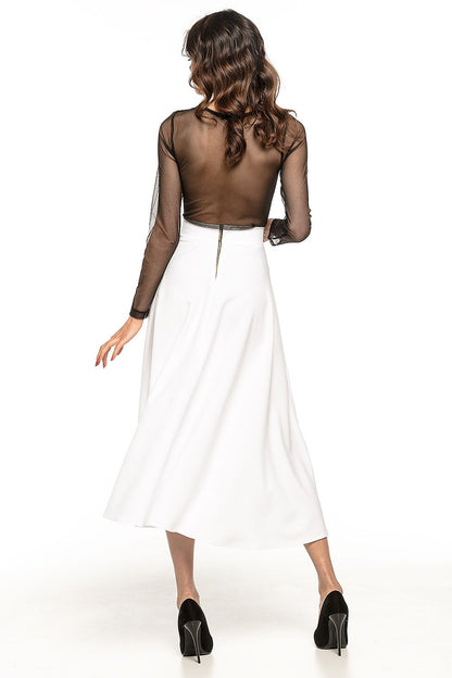 Flat lay of the Tessita 50s inspired midi skirt, showing its quality fabric and versatile style for both casual and formal wear.