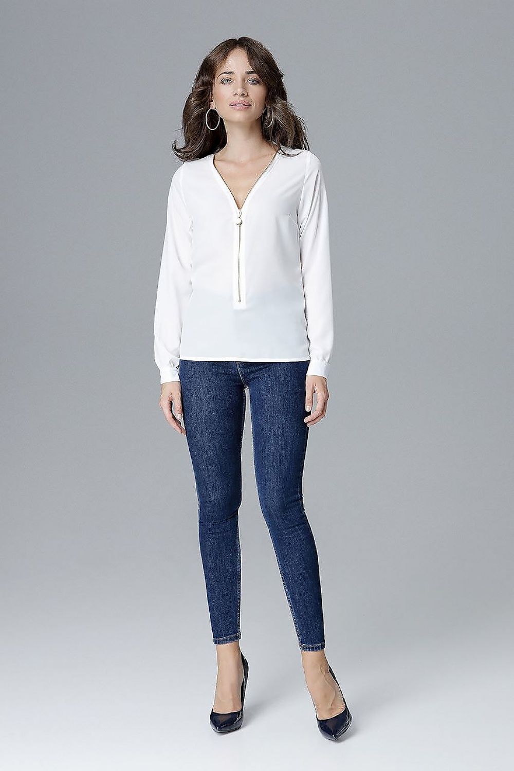 Sophisticated close-up of Lenitif's luxury blouse showcasing its elegant zipper detail, perfect for fashionable outfits.