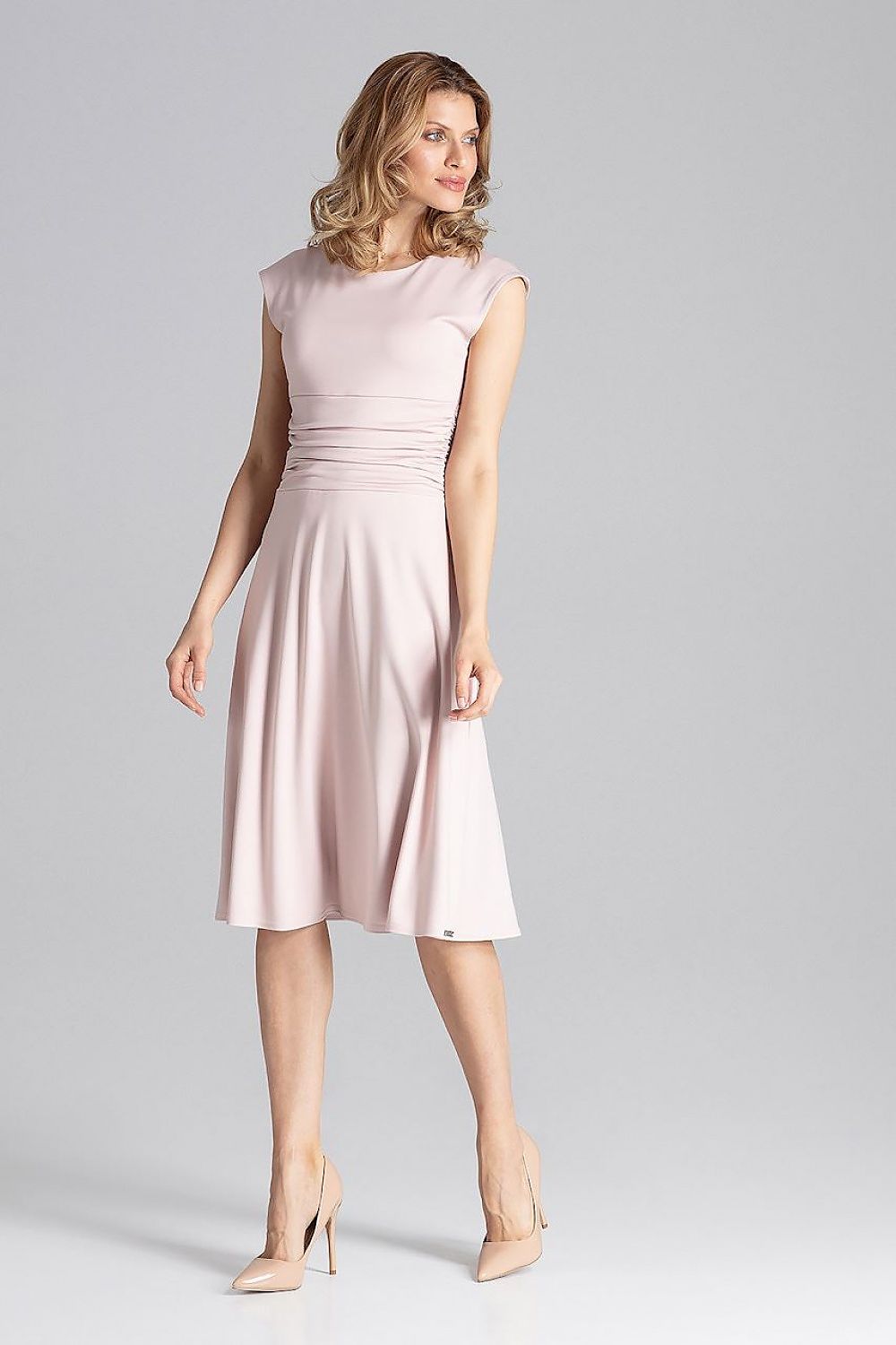 Elegant Figl Daydress photographed in a chic outdoor environment, ideal for daytime or evening occasions.
