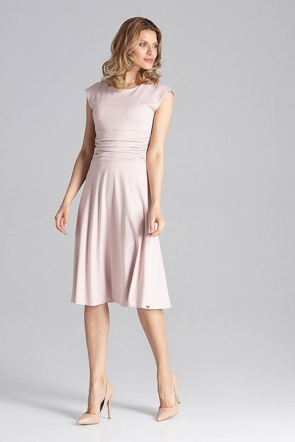 Elegant Figl Daydress photographed in a chic outdoor environment, ideal for daytime or evening occasions.