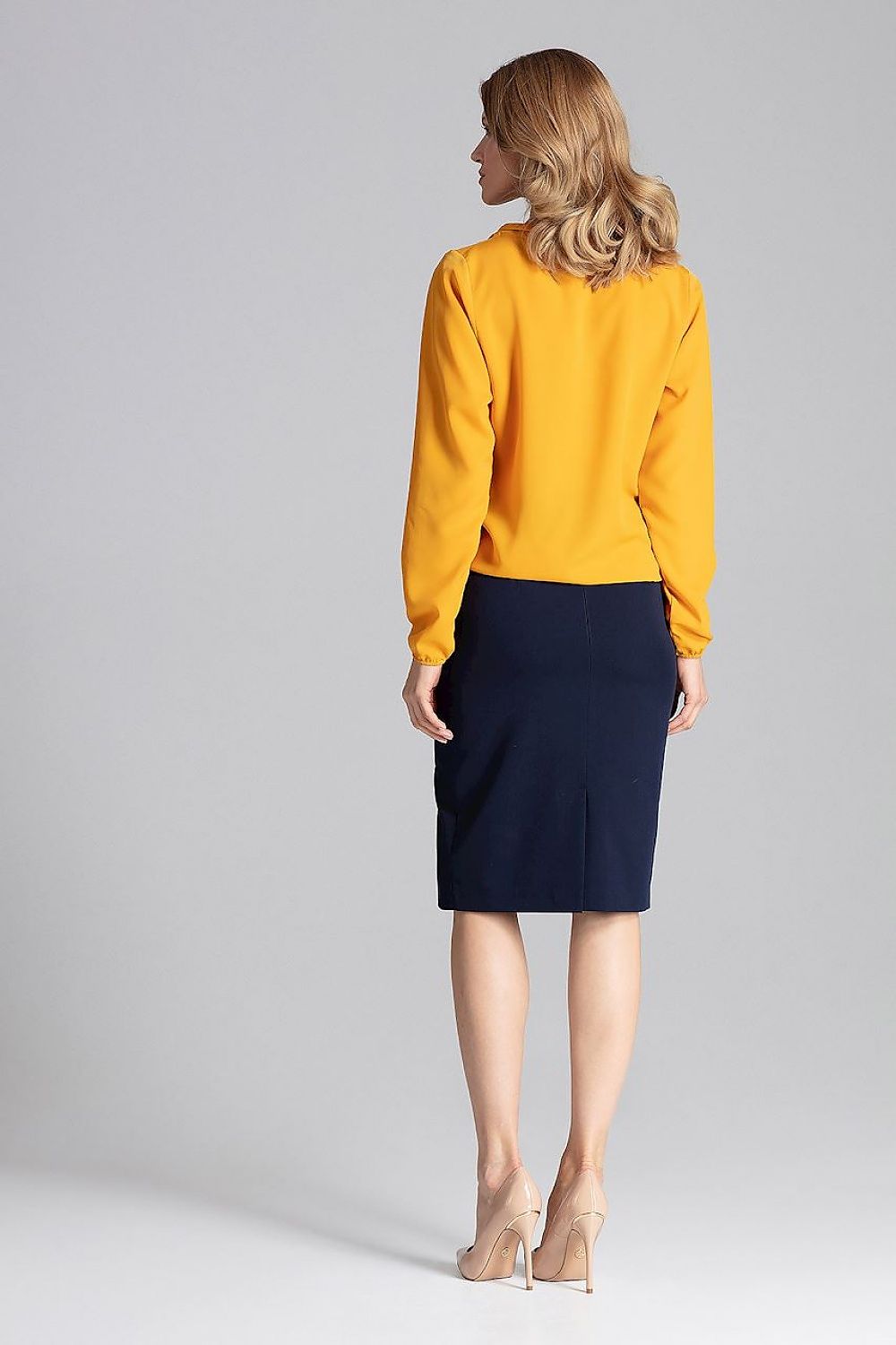 Elegant Figl Blouse With Envelope Neckline And Elastic Finish displayed on a model, demonstrating its flattering fit and versatility.