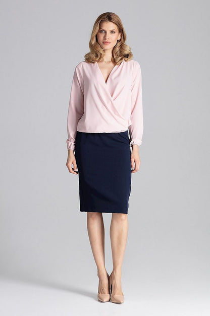 Elegant Figl Blouse with Envelope Neckline and Elastic Finish showcasing a sophisticated design in a luxurious setting.
