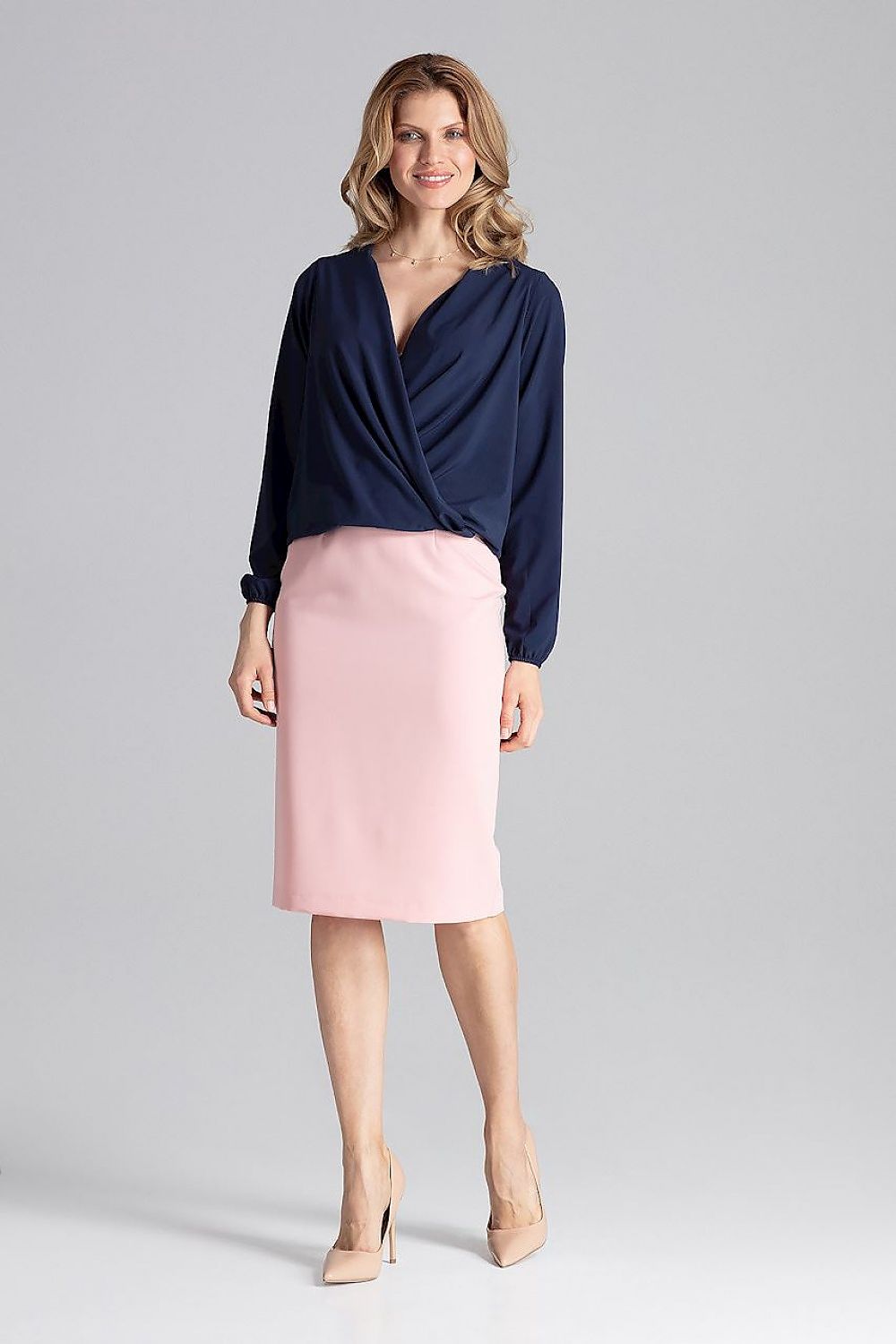 Flat lay of the Figl Blouse showcasing its luxurious fabric and elegant features, perfect for versatile styling.