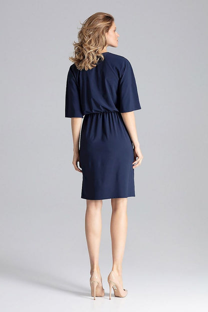Elegant Knee-Length Daydress by Figl styled with heels, ideal for a sophisticated evening look.