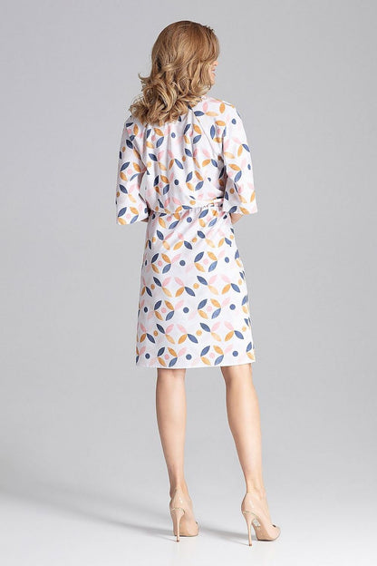 Close-up view of the Elegant Knee-Length Daydress by Figl, highlighting the round neckline and elastic waist, epitomizing modern elegance and comfort.