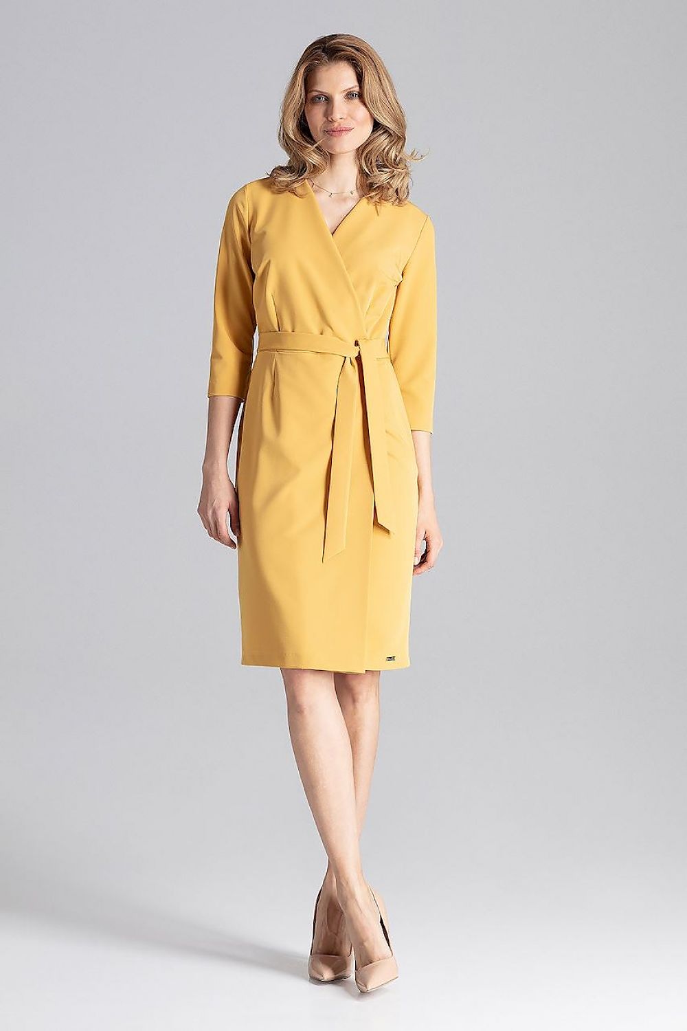 Elegant Figl Daydress featuring a sophisticated envelope neckline, elbow-length sleeves, and a decorative belt, perfect for the modern woman's wardrobe.