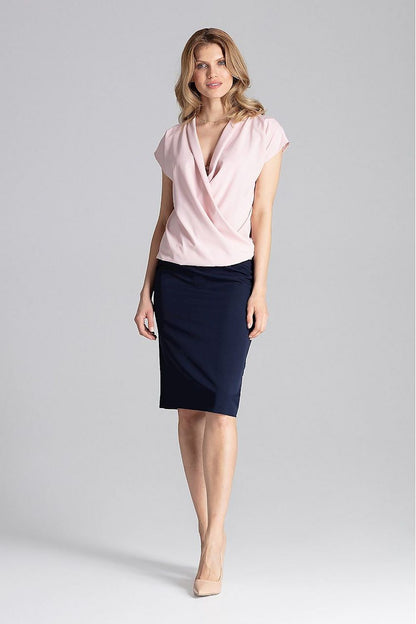 Elegant Figl Blouse With Envelope Neckline displayed on a mannequin, illustrating the chic silhouette and versatile design.