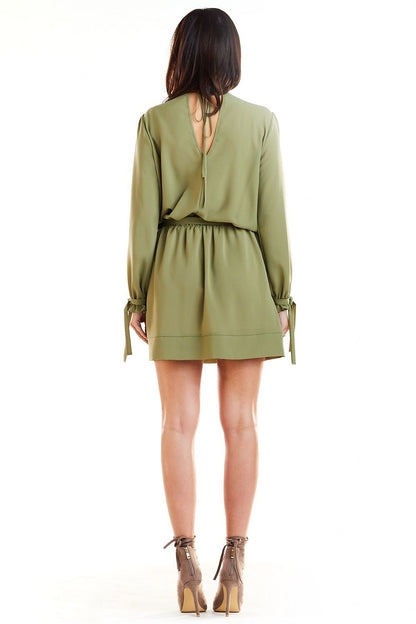 Stylish pairing of the Elegant Awama Daydress in Boho Style with gold accessories, perfect for an elegant brunch or garden party.