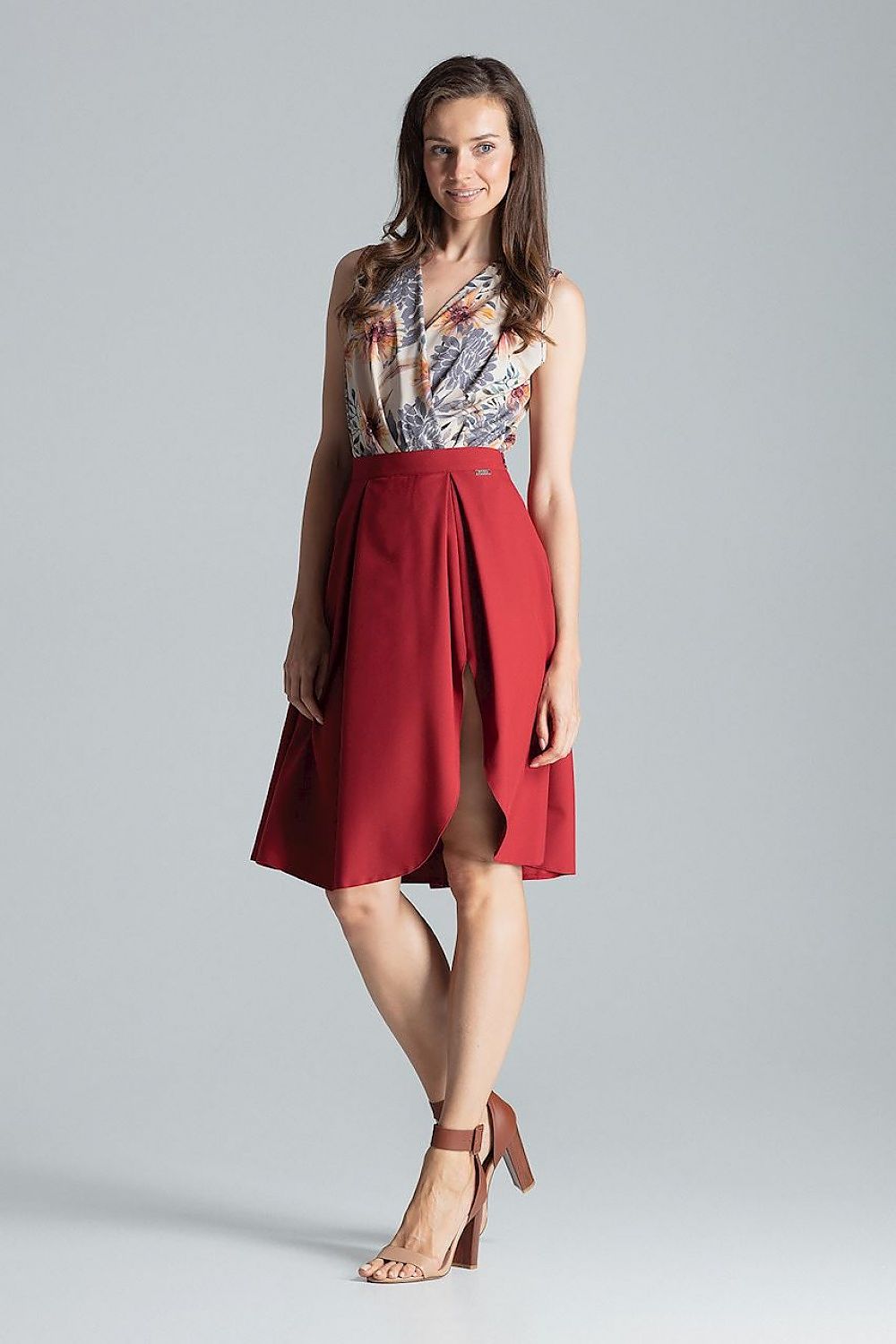 Elegant Burgundy Midi Skirt With Asymmetrical Slit by Figl, designed with an elegant slit, perfect for a sophisticated wardrobe.