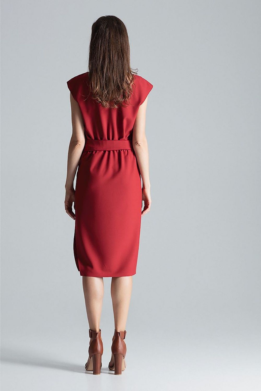 Stylish burgundy midi dress by Figl showcasing a flattering v-neck, ornate waist belt, and chic asymmetrical slit.