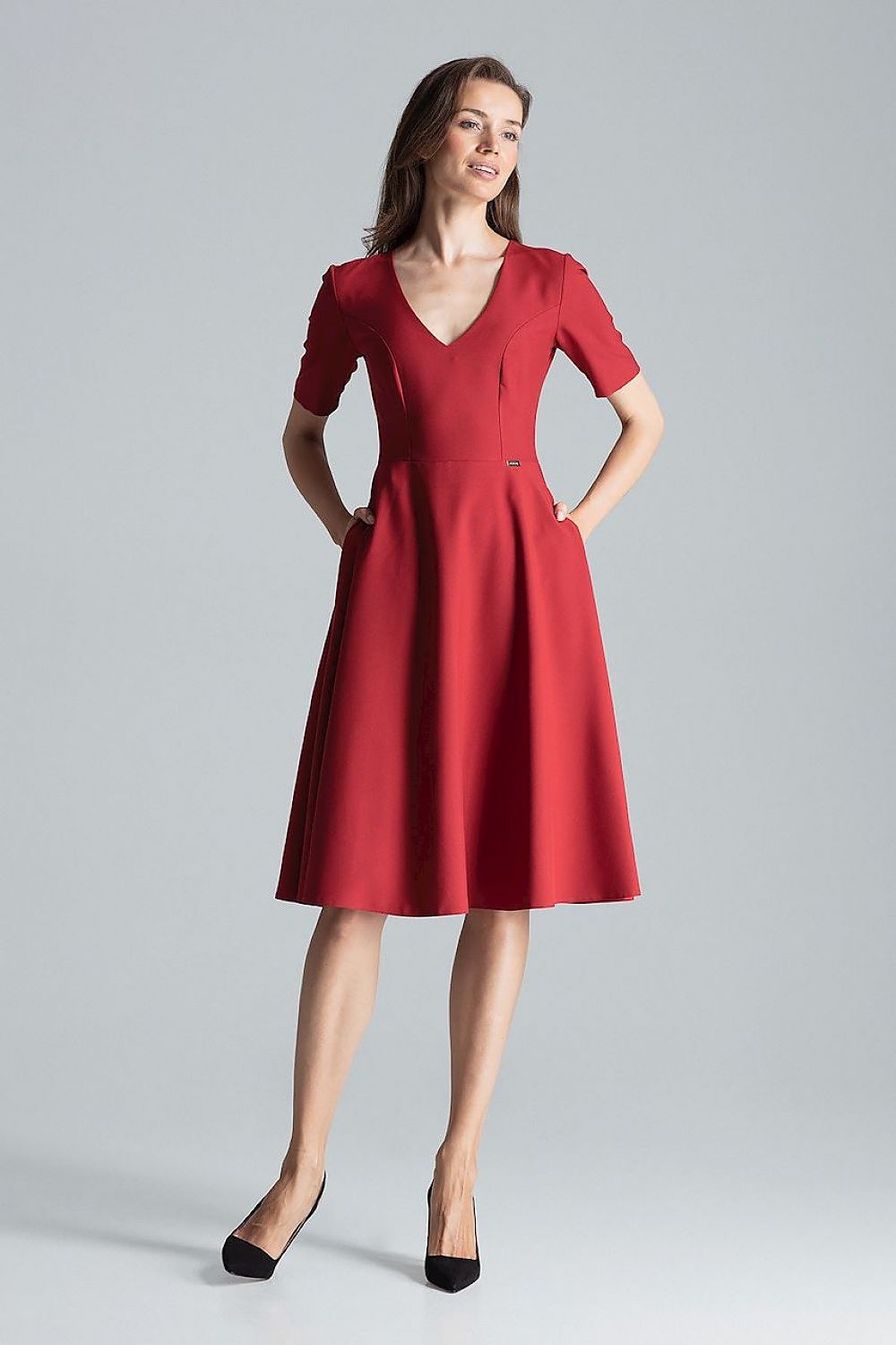 Sophisticated maroon midi dress by Figl, designed with short sleeves, a flared skirt, and discreet side pockets for a chic look.