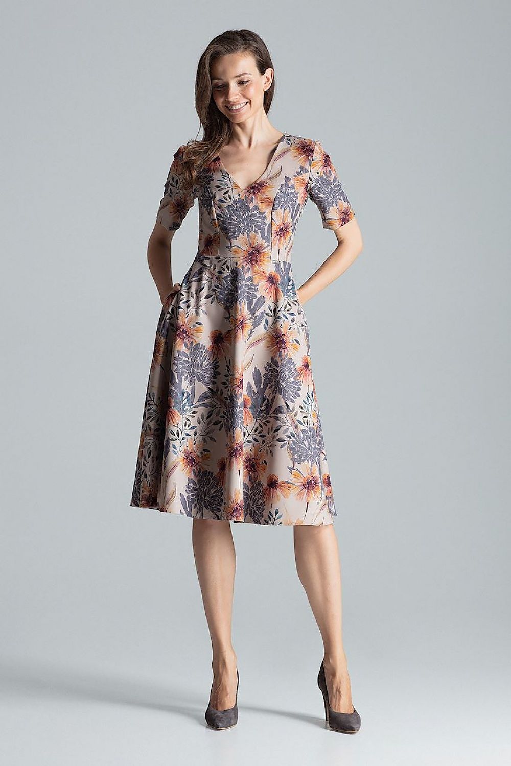 Sophisticated maroon midi dress with flared skirt and side pockets, designed by Figl for a chic modern look.