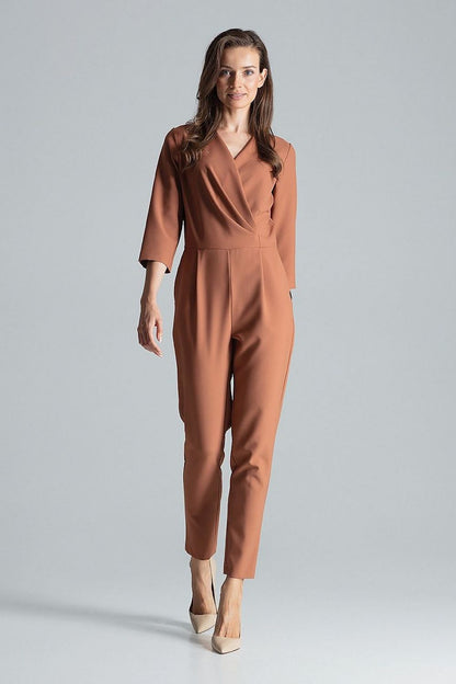 Stylish maroon jumpsuit with side slanted pockets and zip closure at the back by Figl.