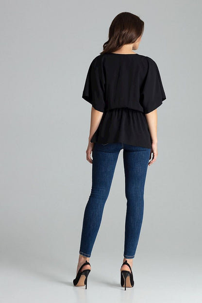 Flat lay of Lenitif Beige Loose-Fitting Blouse with Kimono Sleeves and Waist Elastic - Elegant Casual Top against a stylish background, emphasizing its casual elegance.