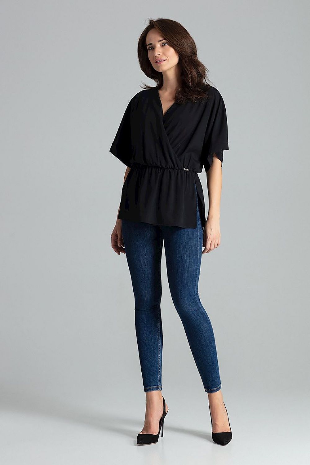 Model wearing Lenitif Beige Loose-Fitting Blouse with Kimono Sleeves and Waist Elastic - Elegant Casual Top, demonstrating its loose fit and sophisticated style.