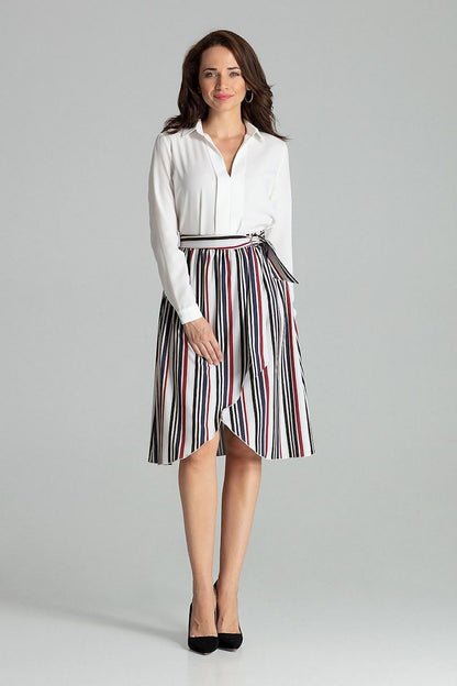 Fashion model wearing the Sapphire Midi Skirt with Pleated Waist and Gold Buckle Detail by Lenitif, showcasing a luxurious outfit.