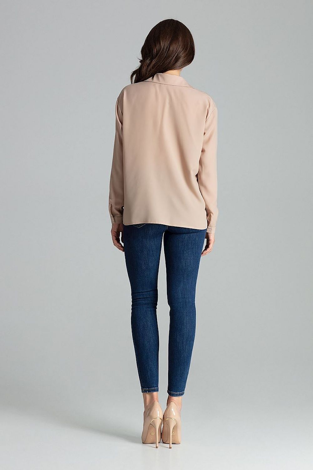 Lenitif Long Sleeve Button-Up Shirt with Pocket displayed on a model, exuding sophistication and elegance in a formal setting.