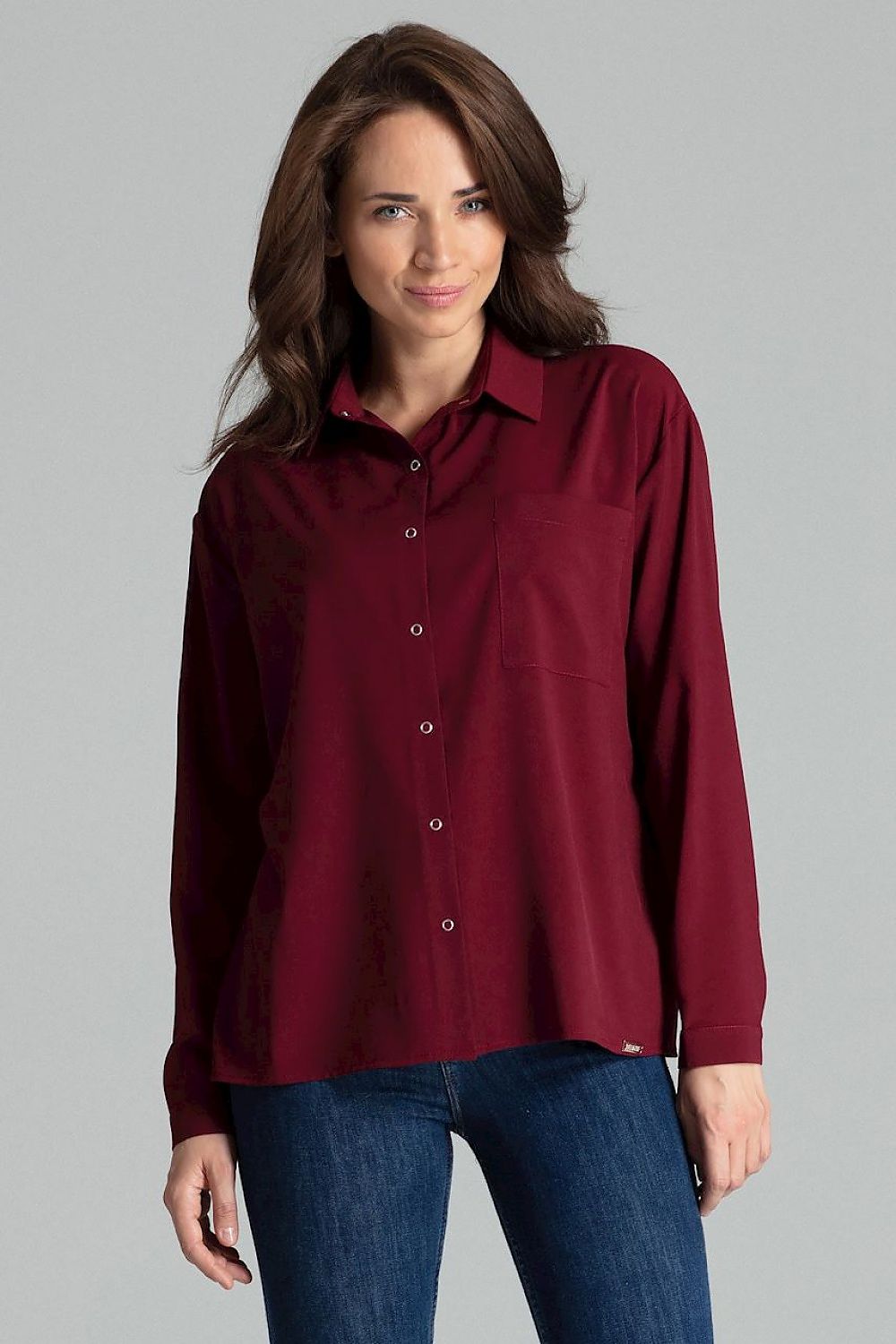 Stylish display of Lenitif Long Sleeve Button-Up Shirt with Pocket, perfect for upscale casual wear.