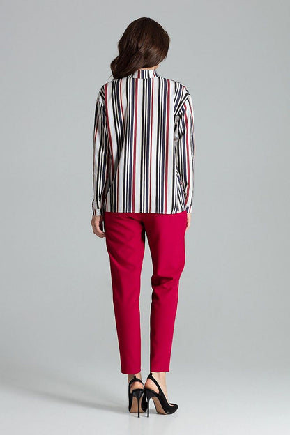 Model wearing the Lenitif Long Sleeve Button-Up Shirt with Pocket, exemplifying luxury and modern elegance in everyday attire.